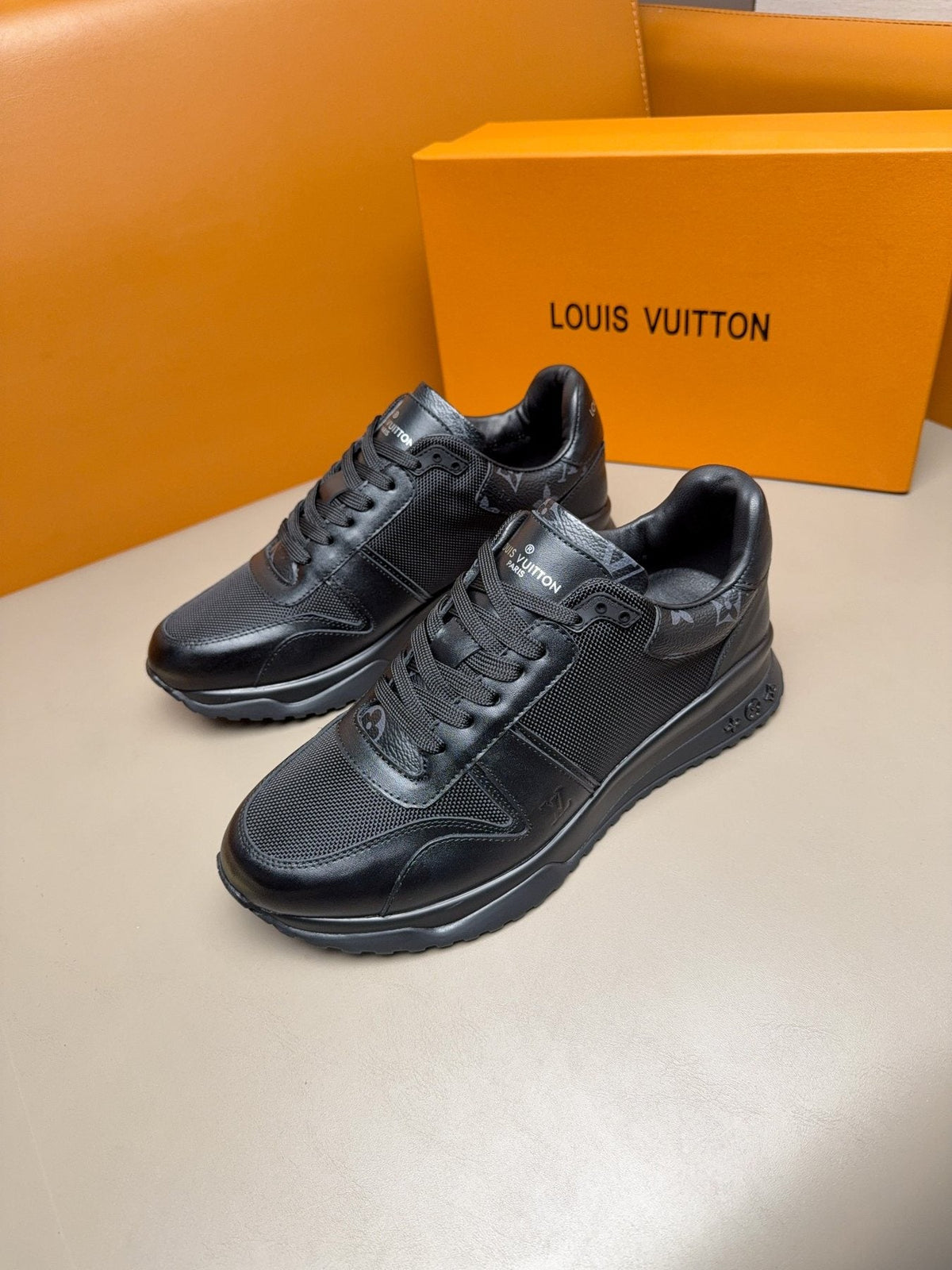 Louis Vuitton Black Leather & Mesh Sneakers — front