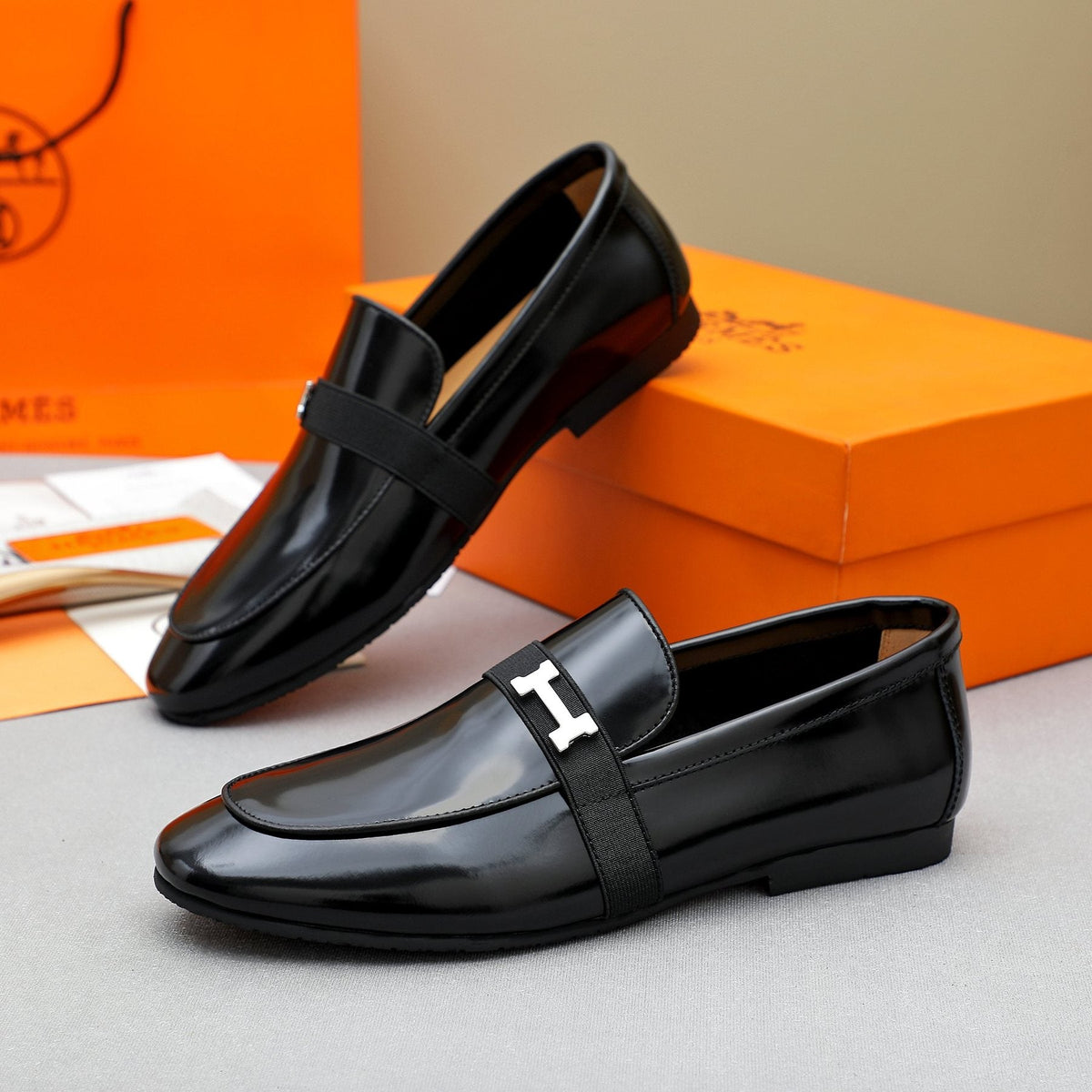 Hermès Black H-Hardware Loafers — side
