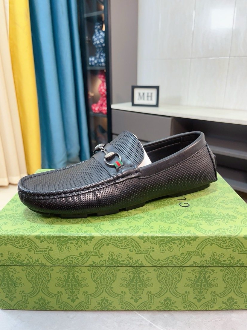Gucci Perforated Metal Hardware Loafers — front